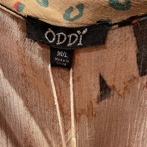 Beautiful short sleeve. I lost weight and now it is to big. NWT, size M/L